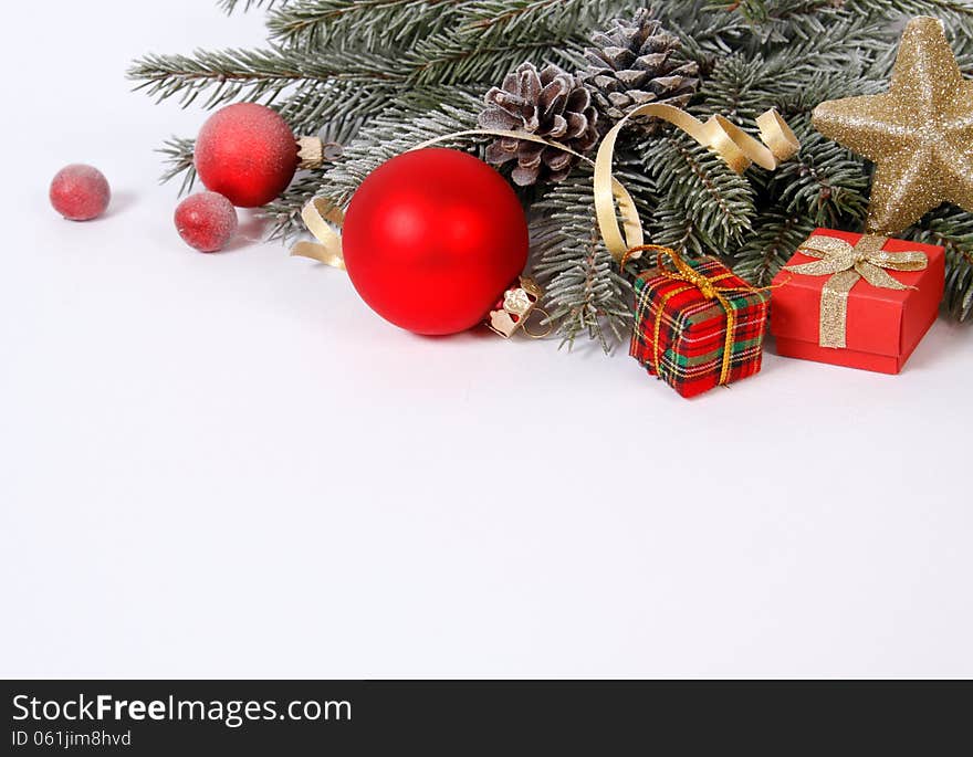 Christmas decoration with the twigs of the spruce and baubles. Christmas decoration with the twigs of the spruce and baubles