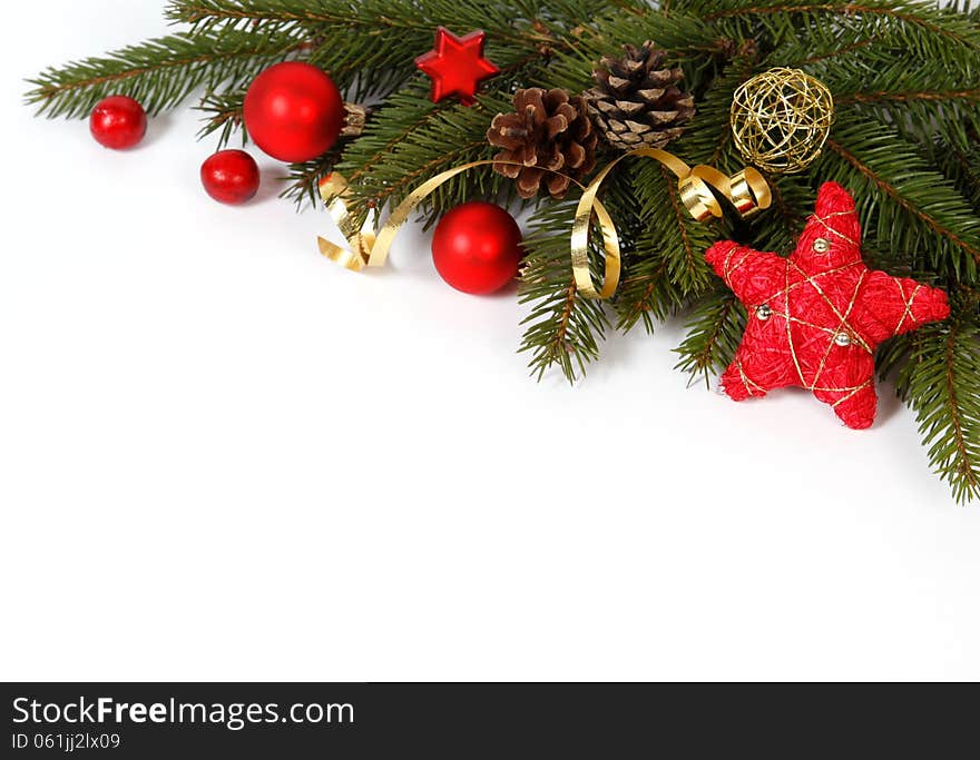 Christmas decoration with the twigs of the spruce and baubles