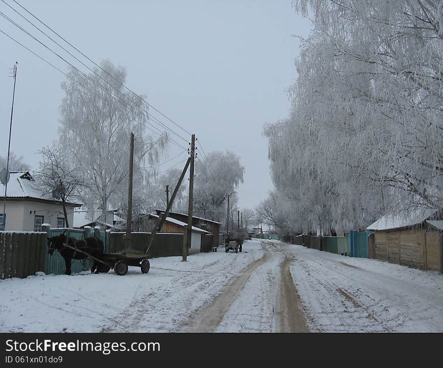 Winter landscape with rural street in snow. Winter landscape with rural street in snow