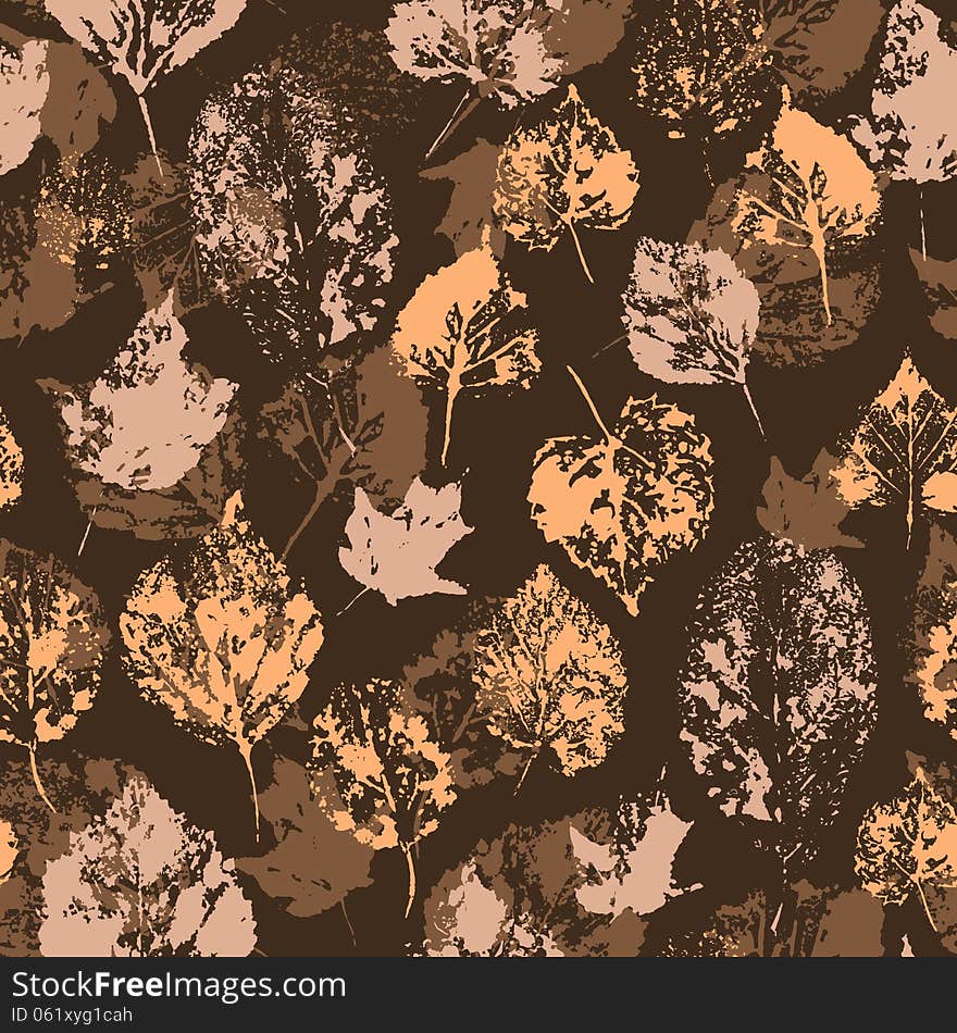 Seamless texture with stamped autumn leaves