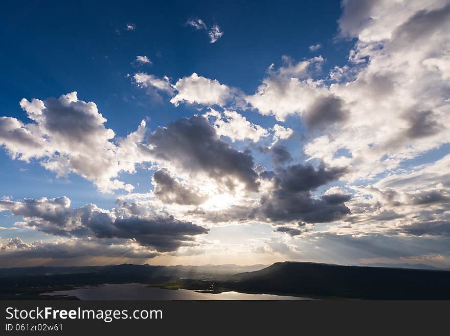 Clouds sun shine ray through. Clouds sun shine ray through