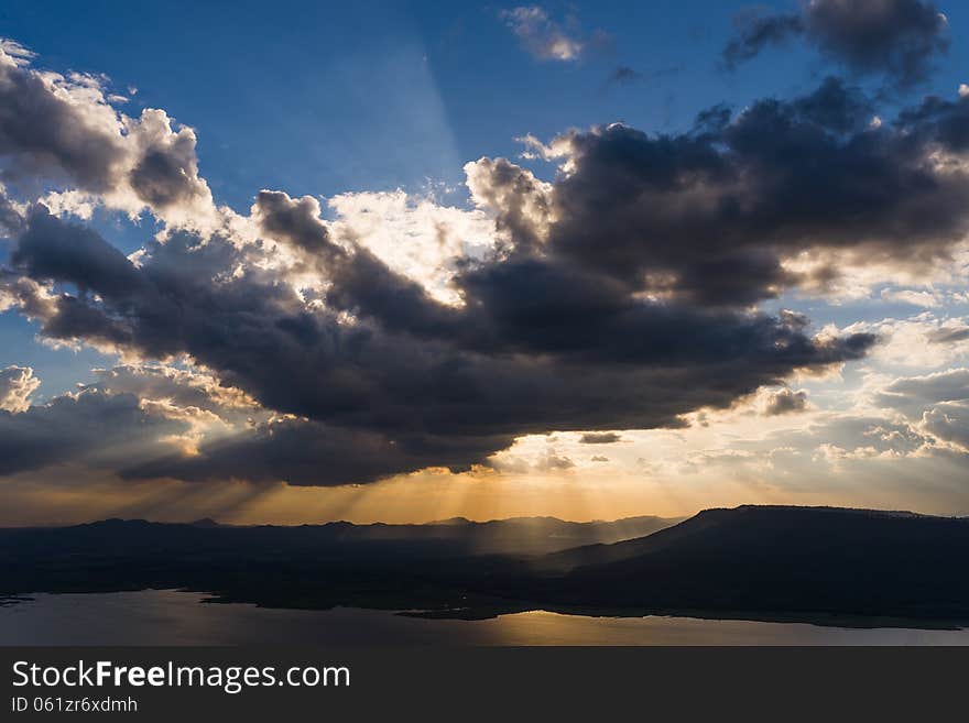 Clouds sun shine ray through. Clouds sun shine ray through