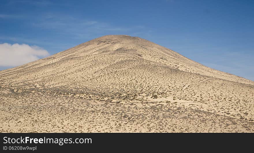 Sand and rocky mountains in Fuerteventura