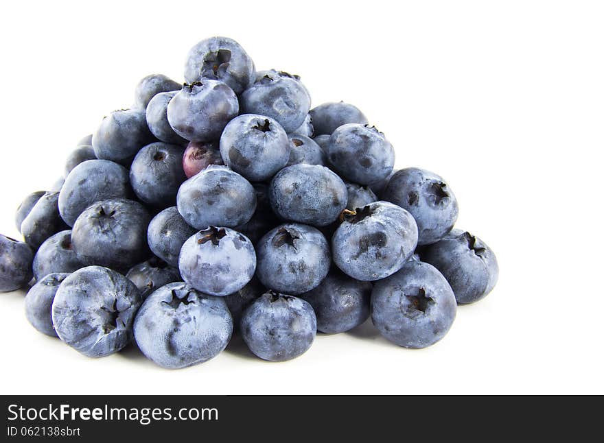 Pyramid of fresh blueberries isolated on white background