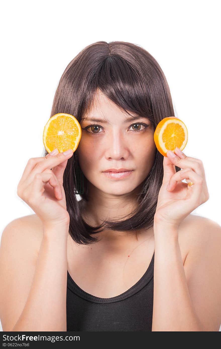 Woman with oranges in her hands