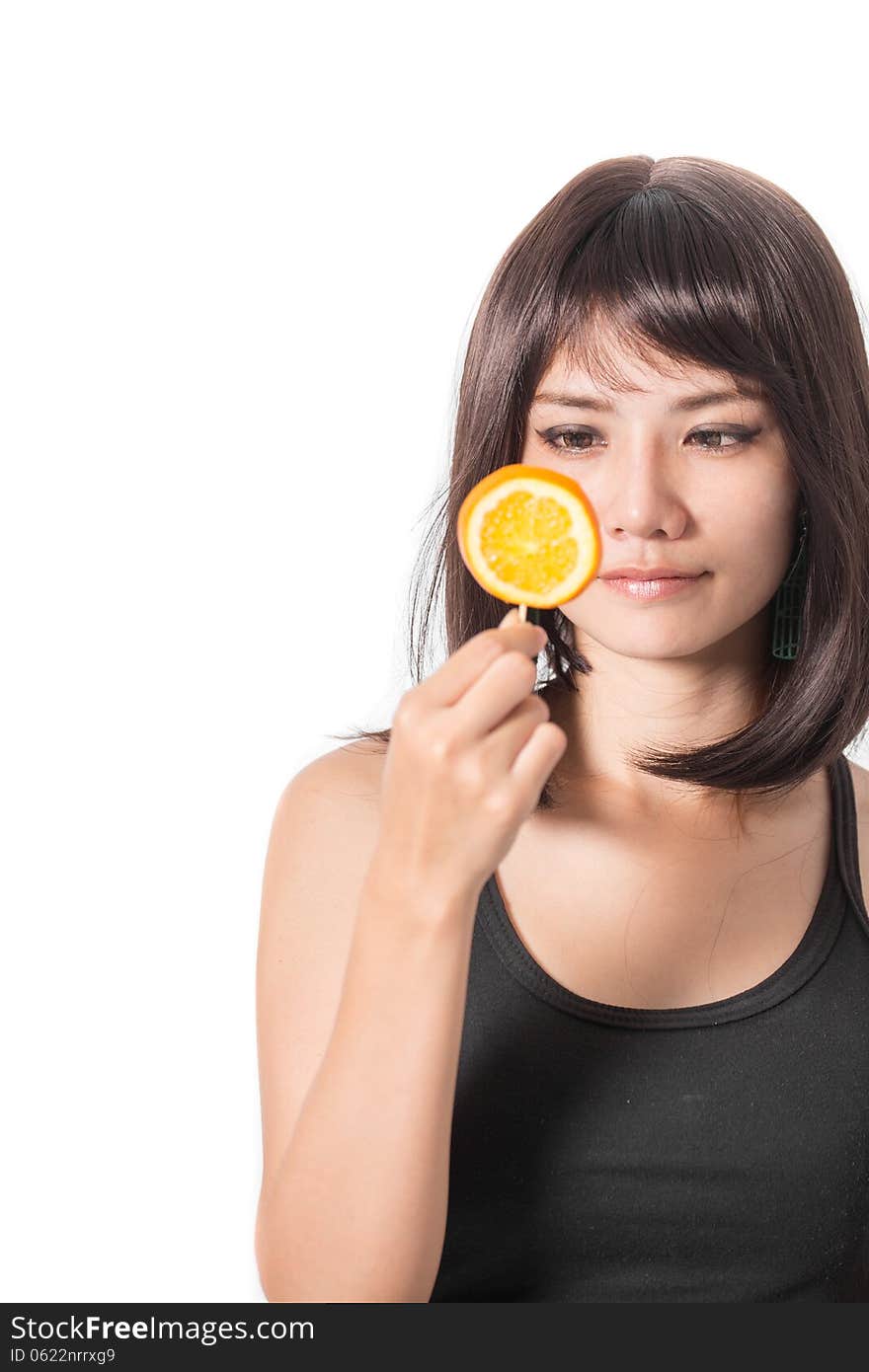 Woman with oranges in her hands