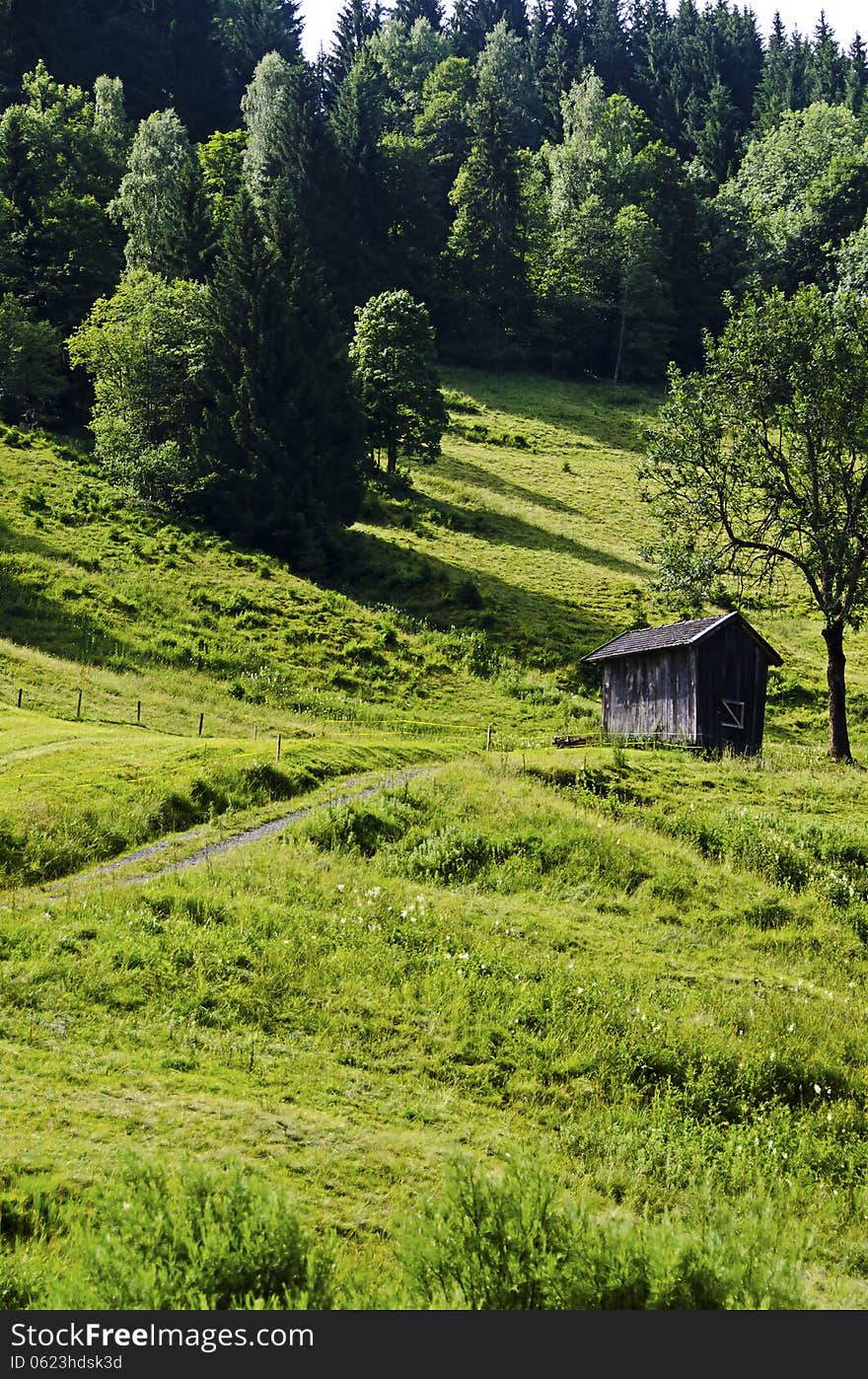 An old wooden barn in the alps mountains, Austria,