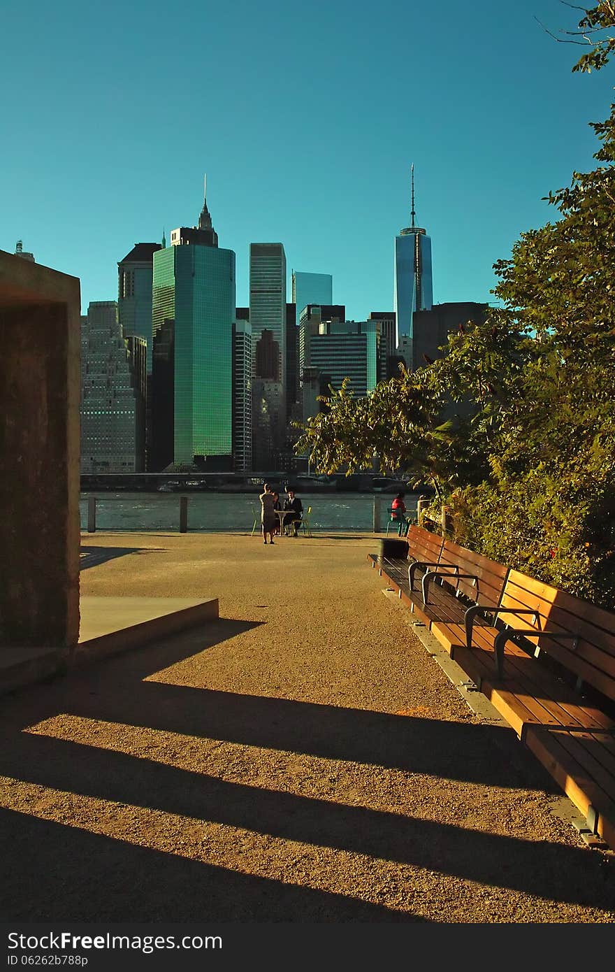 Late afternoon view of Lower Manhattan and new World Trade Center from Brooklyn Bridge Park across the East River. Late afternoon view of Lower Manhattan and new World Trade Center from Brooklyn Bridge Park across the East River.