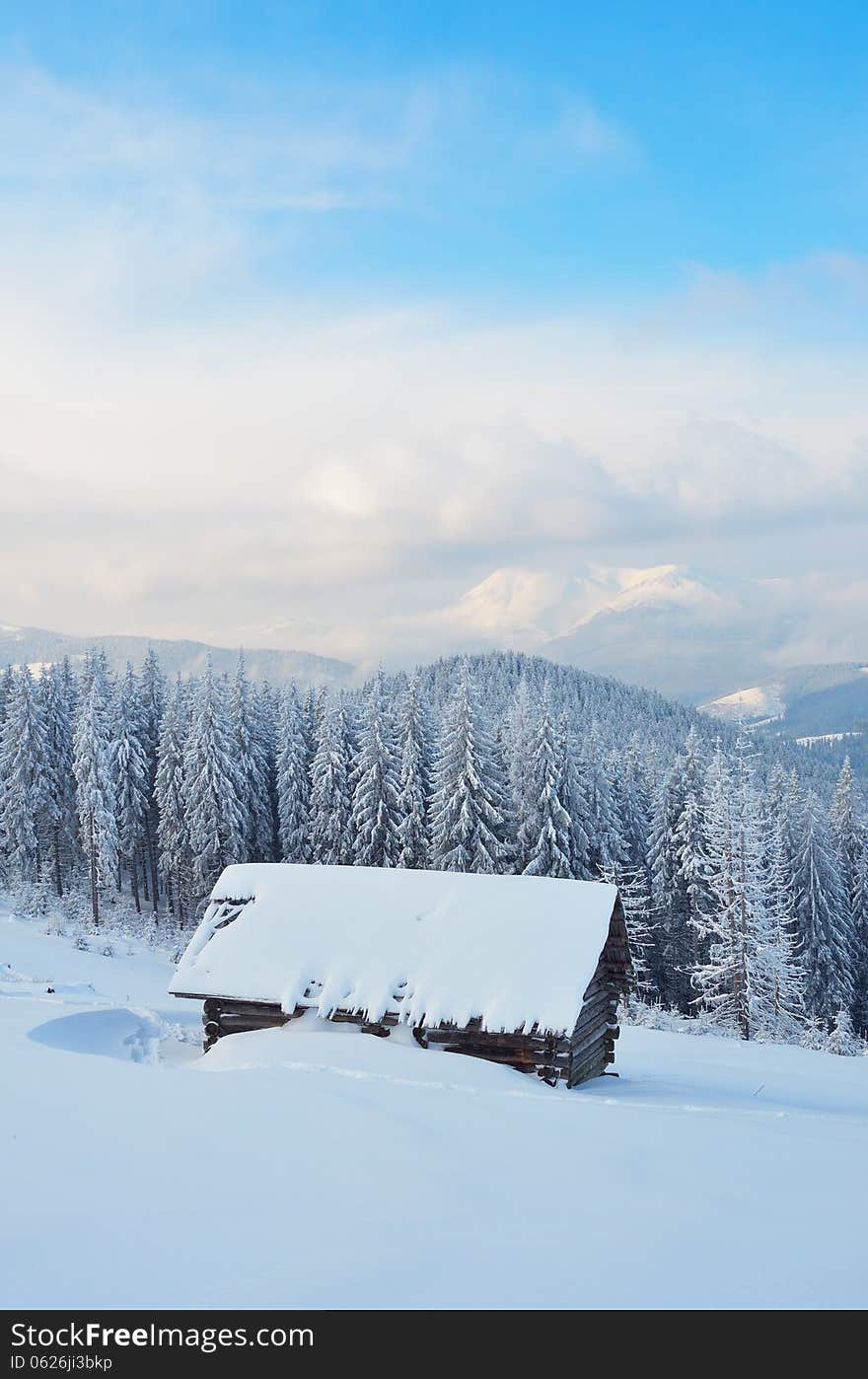 Wooden Hut In The Mountains