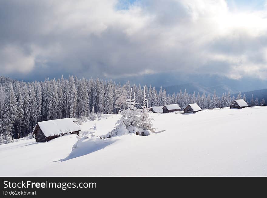 Mountain landscape with snow-covered valley. Carpathians, Ukraine. Mountain landscape with snow-covered valley. Carpathians, Ukraine