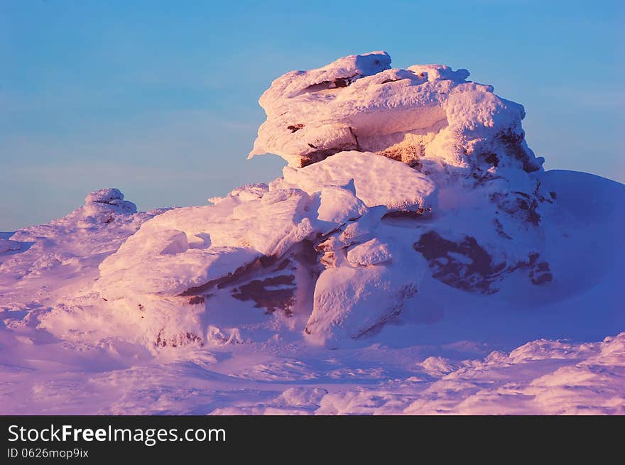 Winter landscape in the mountains with the morning light. Carpathians, Ukraine. Winter landscape in the mountains with the morning light. Carpathians, Ukraine