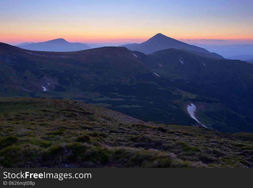 Mountain landscape after sunset. Twilight in the mountains