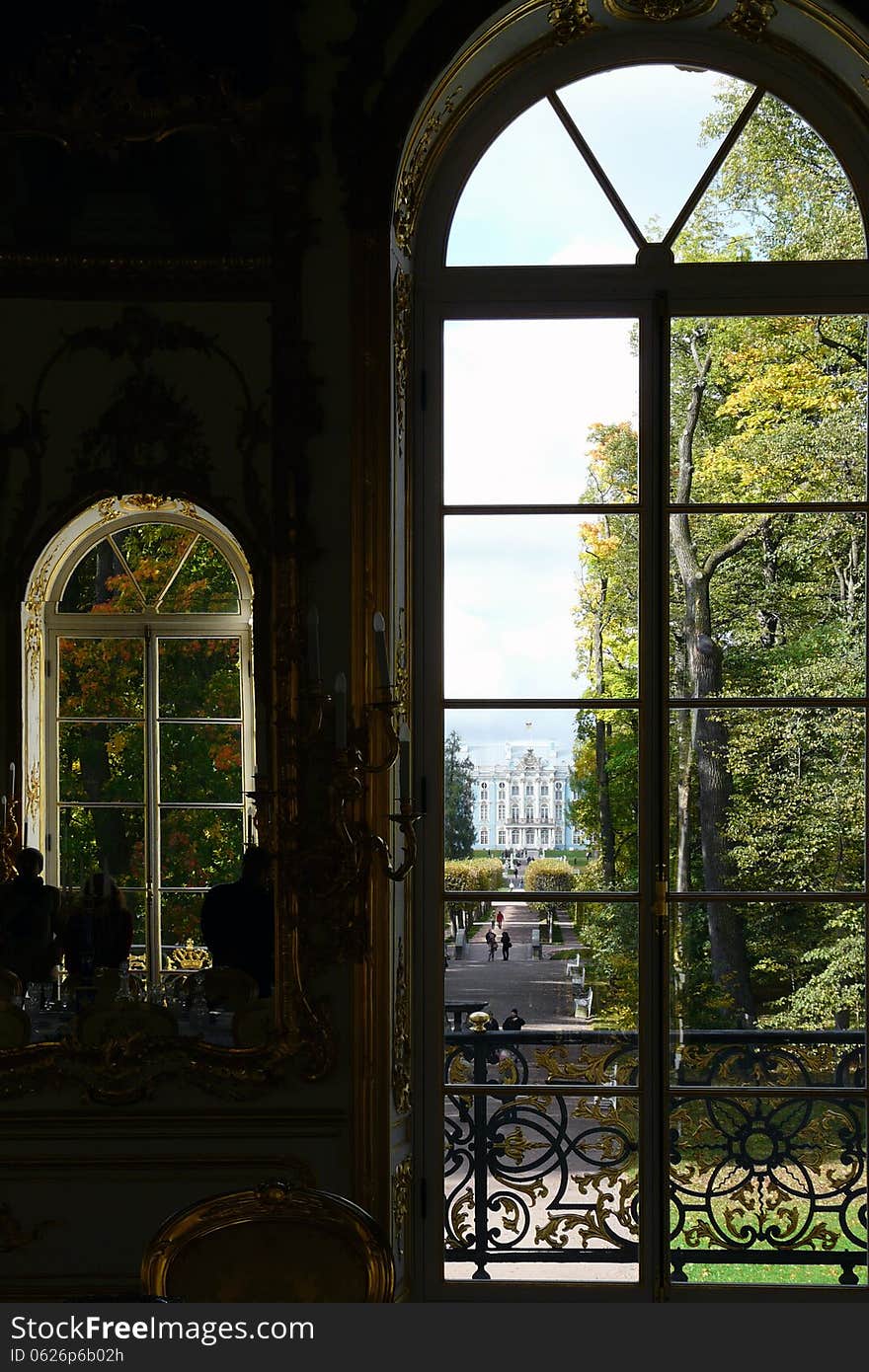 Atherine Palace, St. Petersburg. View through a semi-circular window in the Hermitage palace garden. Atherine Palace, St. Petersburg. View through a semi-circular window in the Hermitage palace garden