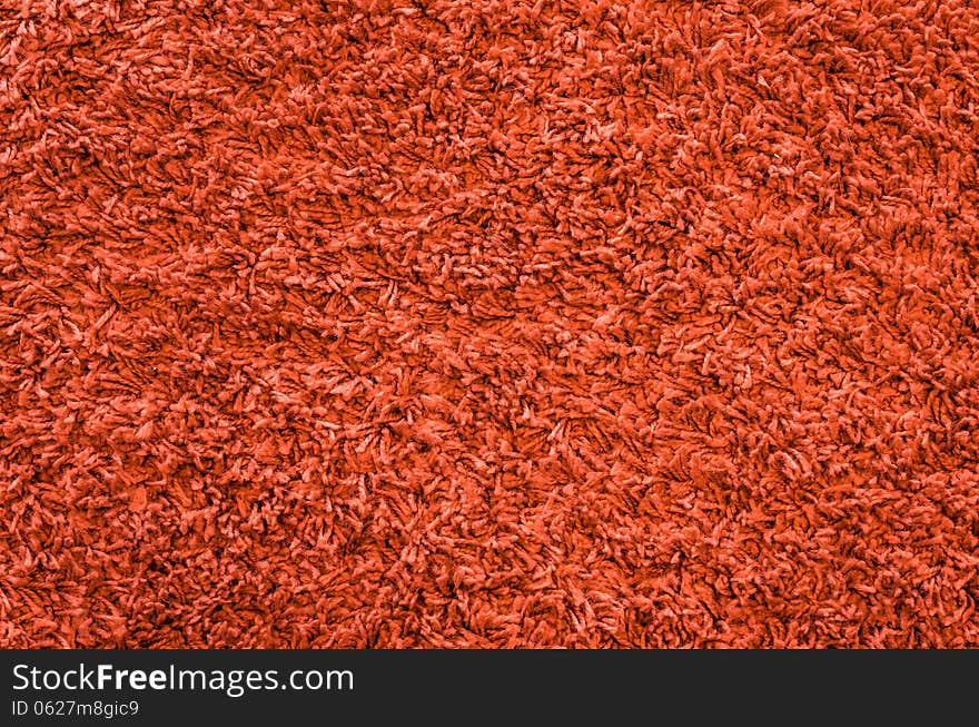 Close up or a red fabric for carpets. Close up or a red fabric for carpets.