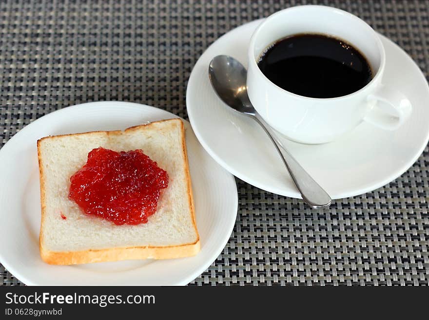 Strawberry Jam On Bread And Coffee