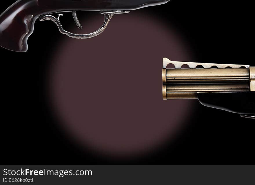 Of Vintage revolver trigger on black background with copy space. Conceptual image for 'pulling the trigger' or initiating action. Of Vintage revolver trigger on black background with copy space. Conceptual image for 'pulling the trigger' or initiating action.