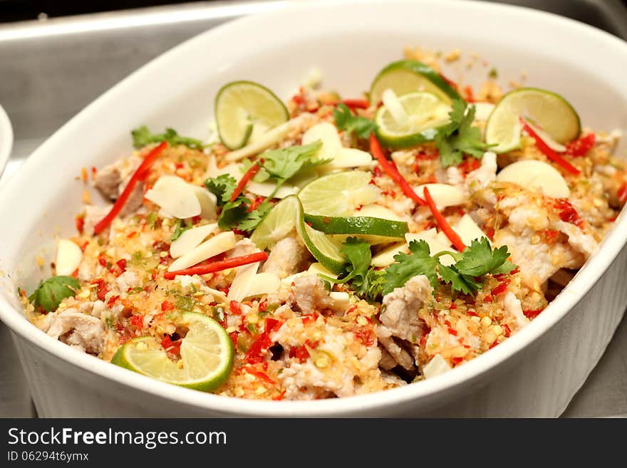 Steamed snapper fish with lemon in white bolwe