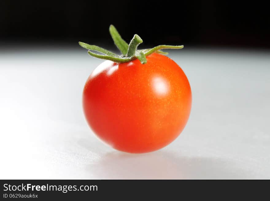 Tomato fruit on dark background