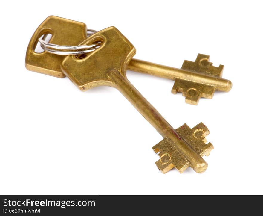 Pair of Old Fashioned Bronze Keys with Ring Lock isolated on white background