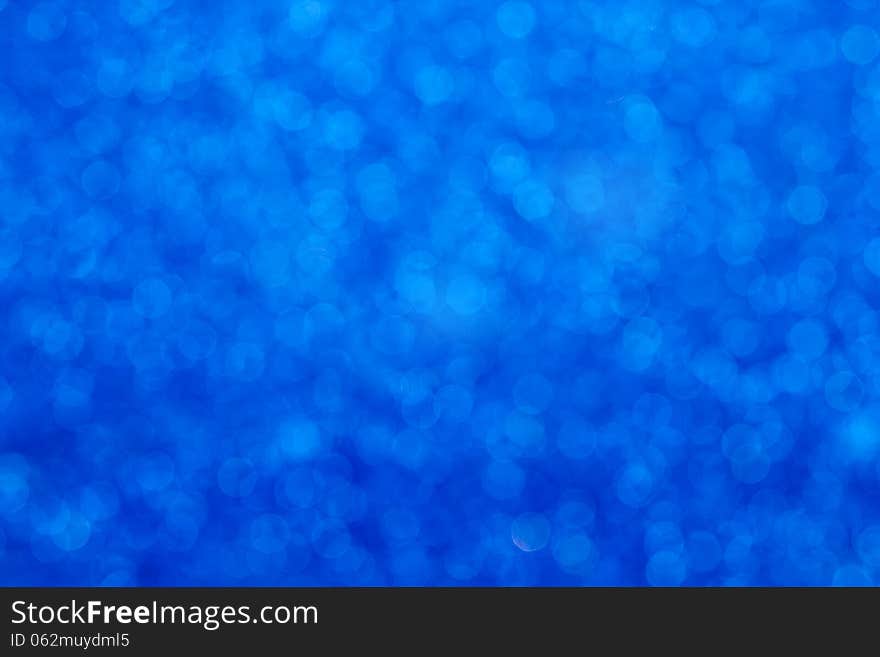 Defocused abstract blue bubble background