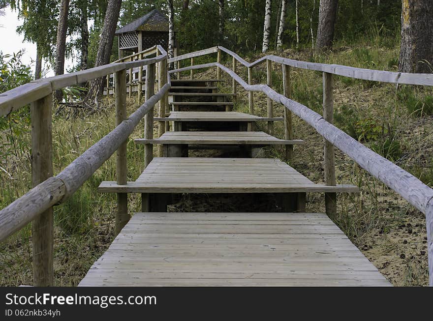 Wooden steps leading to the gazebo in the fall. Wooden steps leading to the gazebo in the fall