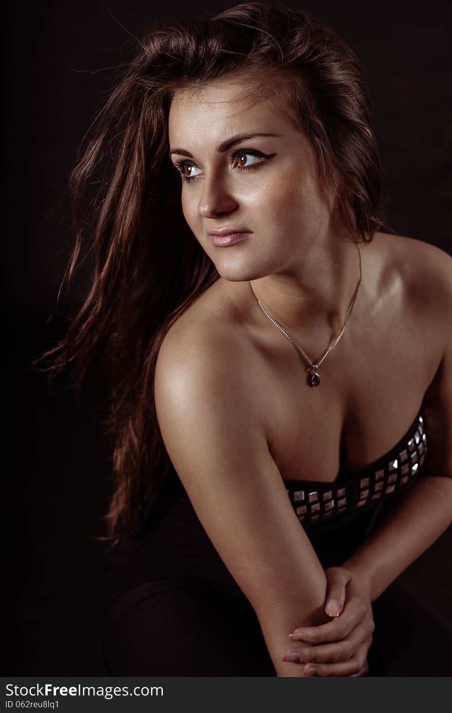 Portrait of sensual romantic beautiful girl on black background