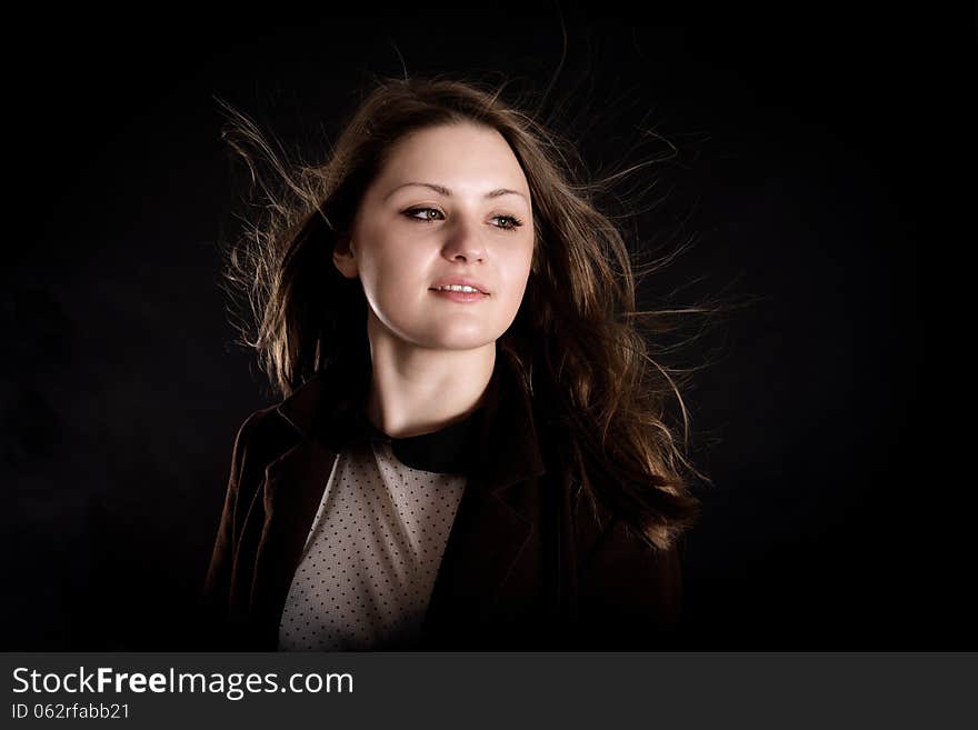 Portrait of sensual romantic beautiful girl on black background