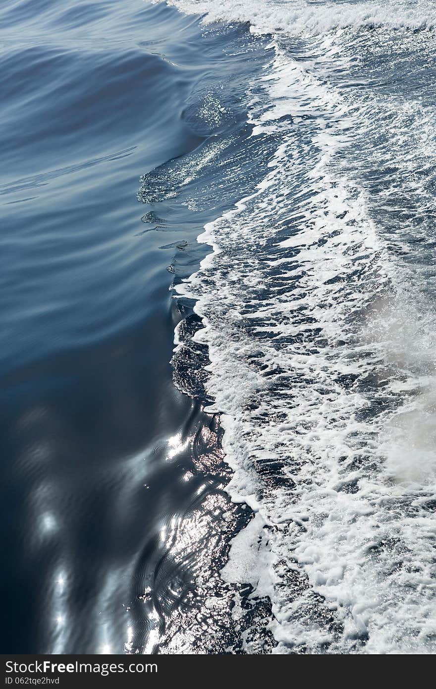 Trace on the sea water after ship. Trace on the sea water after ship