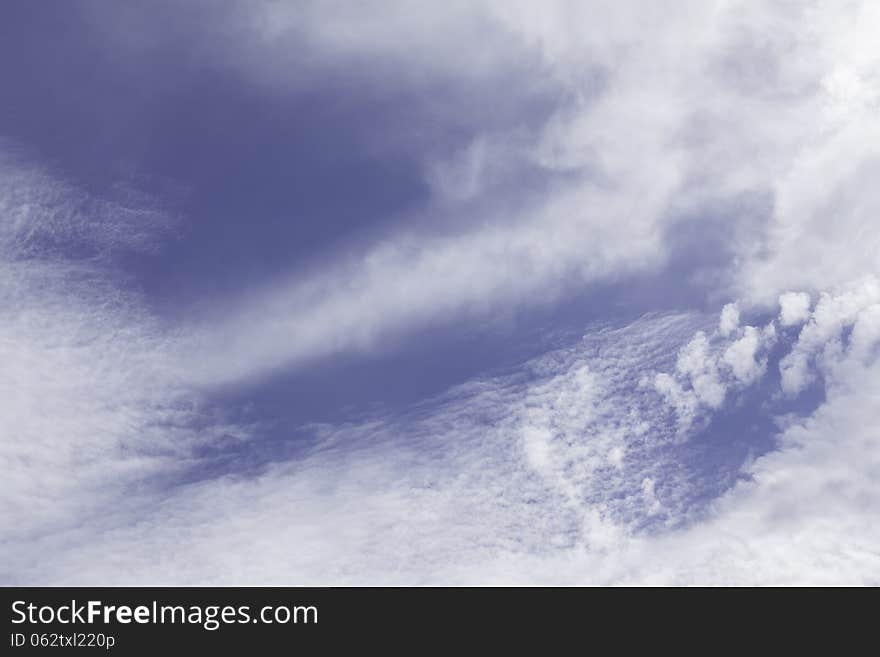 Feather clouds closeup blue mix