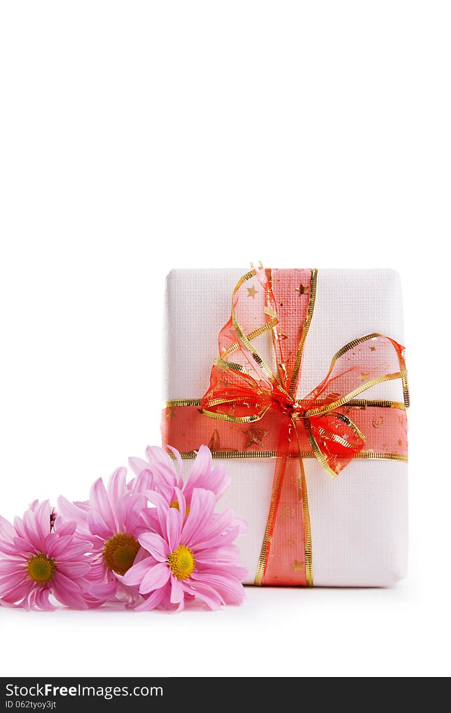 Gift Box With Red Ribbon And Pink Dasies