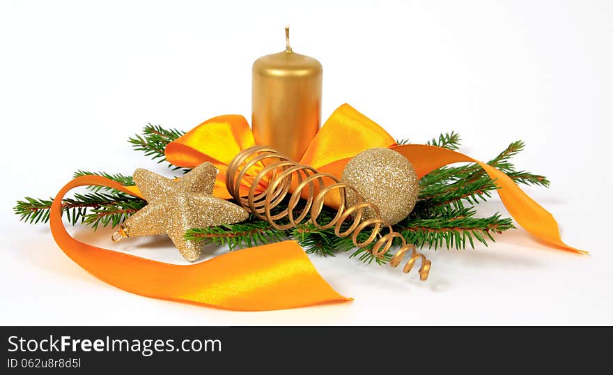 Christmas decoration with the yellow ribbon and candle