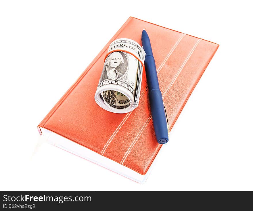 Book, Dollars And Pen On A White Background