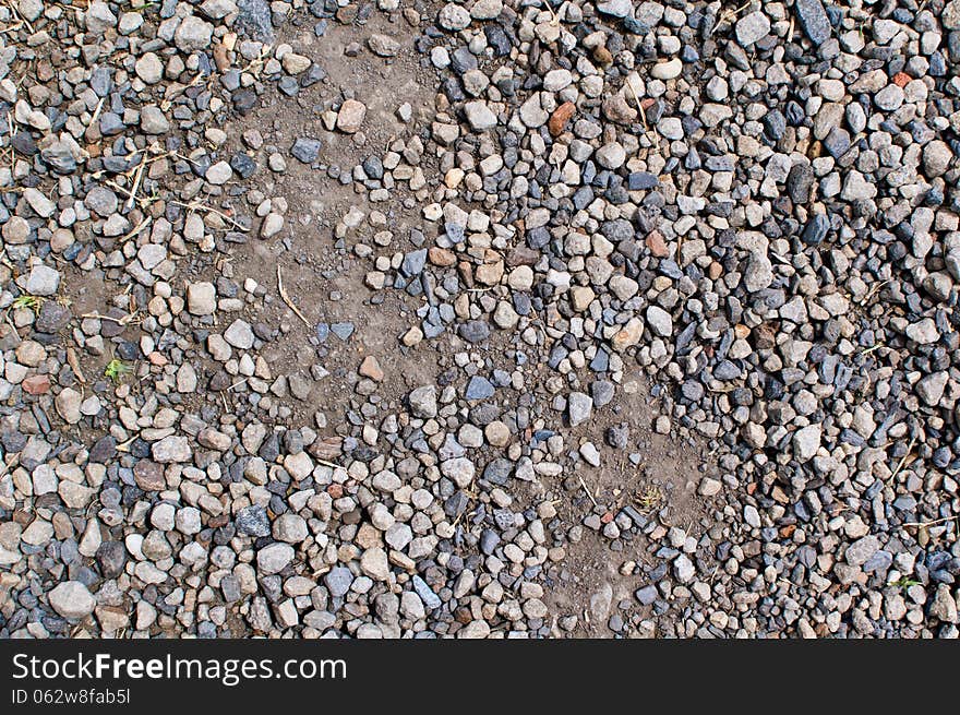 Texture of a disturbed dusty gravel path. Texture of a disturbed dusty gravel path