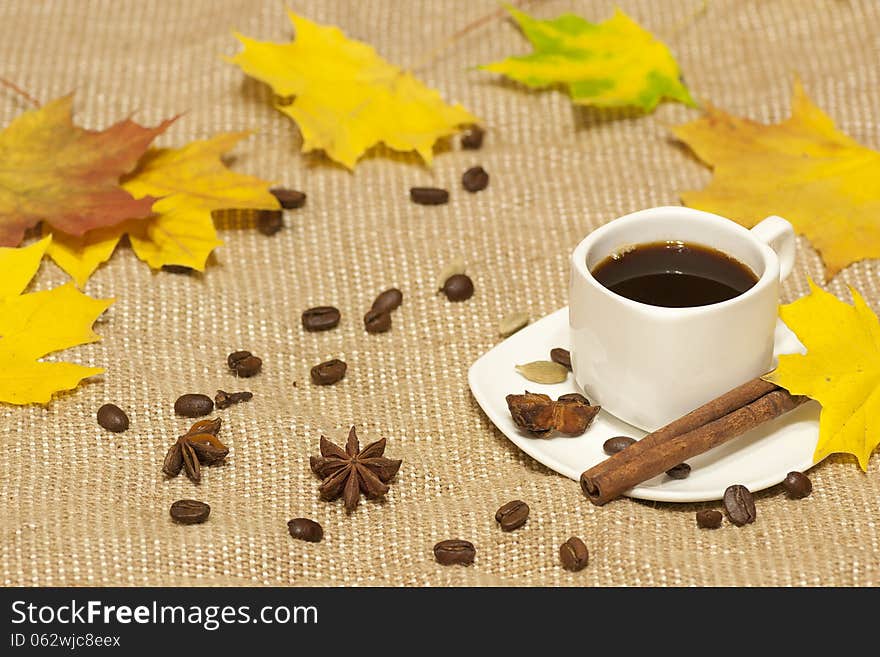 Cup of coffee and yellow leaves. Cup of coffee and yellow leaves