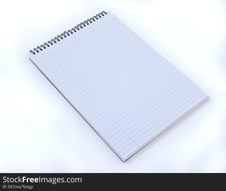 Spiral note pad ready to write notes on. Spiral note pad ready to write notes on