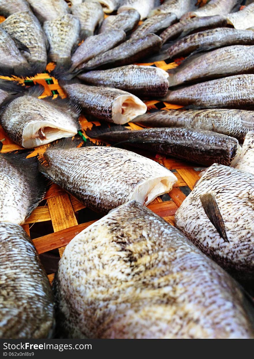 Drying snakeskin gourami fishes in local market, Thailand