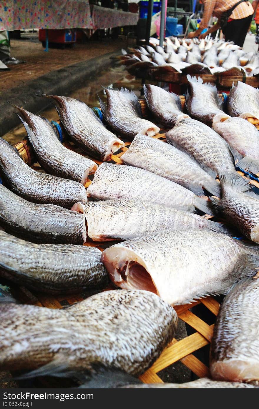 Drying snakeskin gourami fishes in local market, Thailand