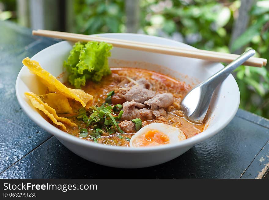 Pork noodle tom yum, condensed water egg.