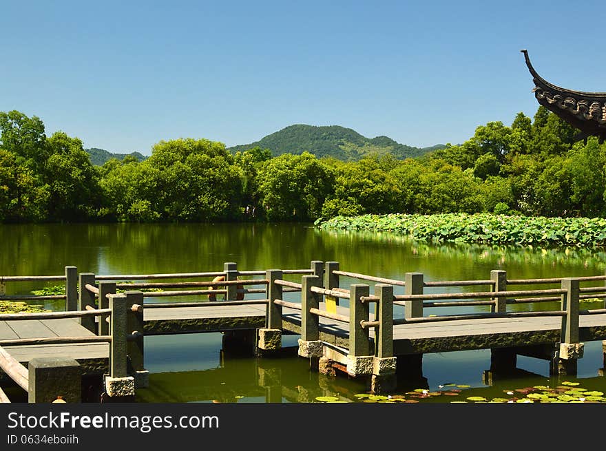 the bridge the beautiful lake and the blue sky. the bridge the beautiful lake and the blue sky