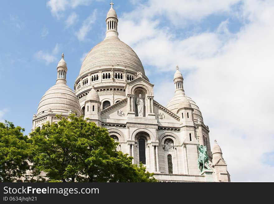 Sacre Coeur Cathedral in Paris, France, under a blue sky. Sacre Coeur Cathedral in Paris, France, under a blue sky.