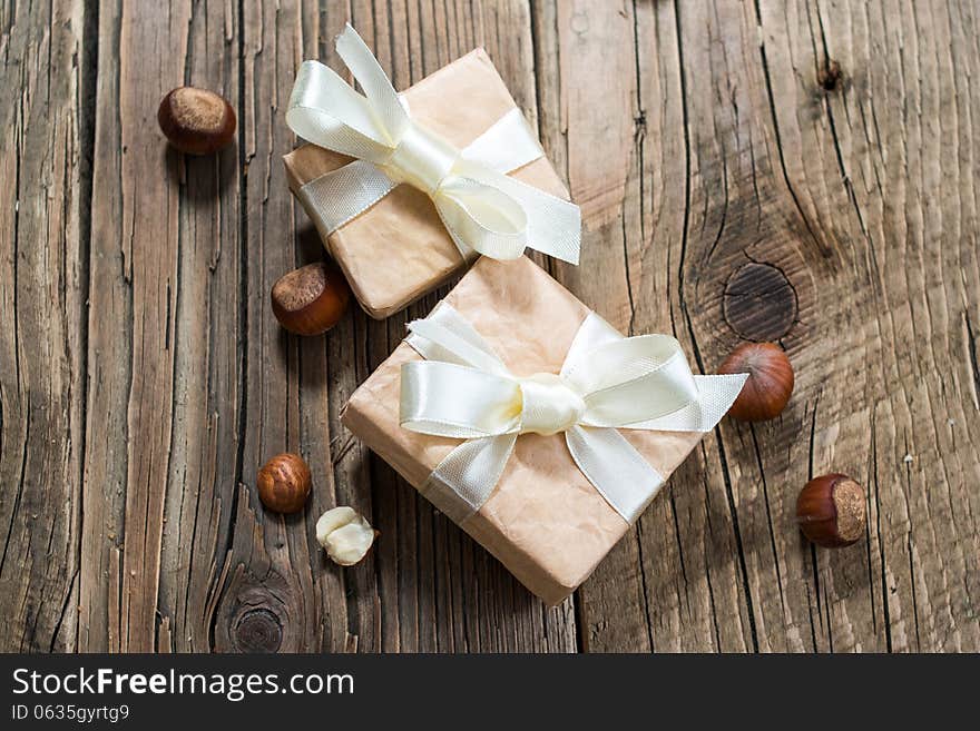 Gift boxes on old wooden background