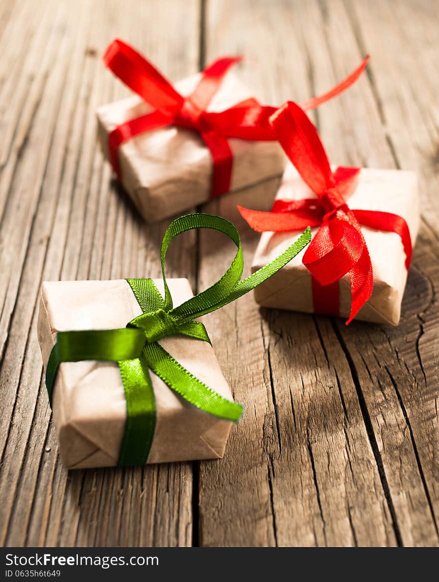 Gift boxes on old wooden background