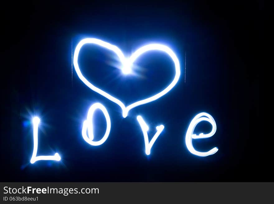 Love heart and a blue glow