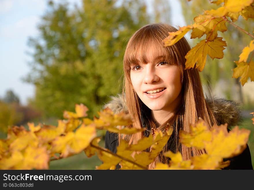 Beautiful young girl with red hair