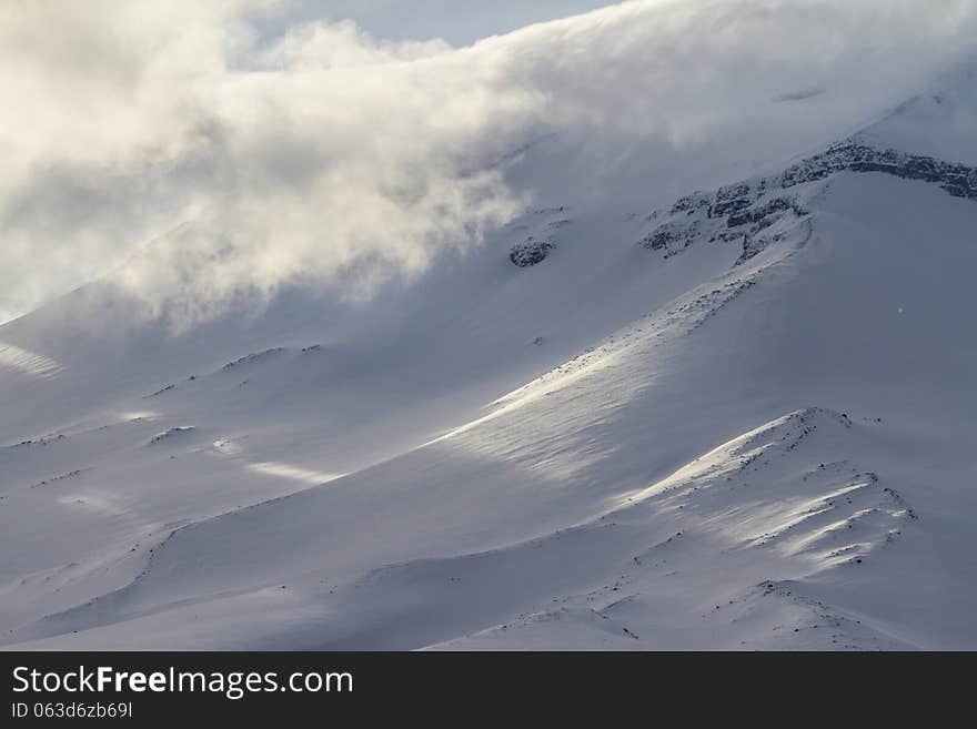 Snow and clouds.