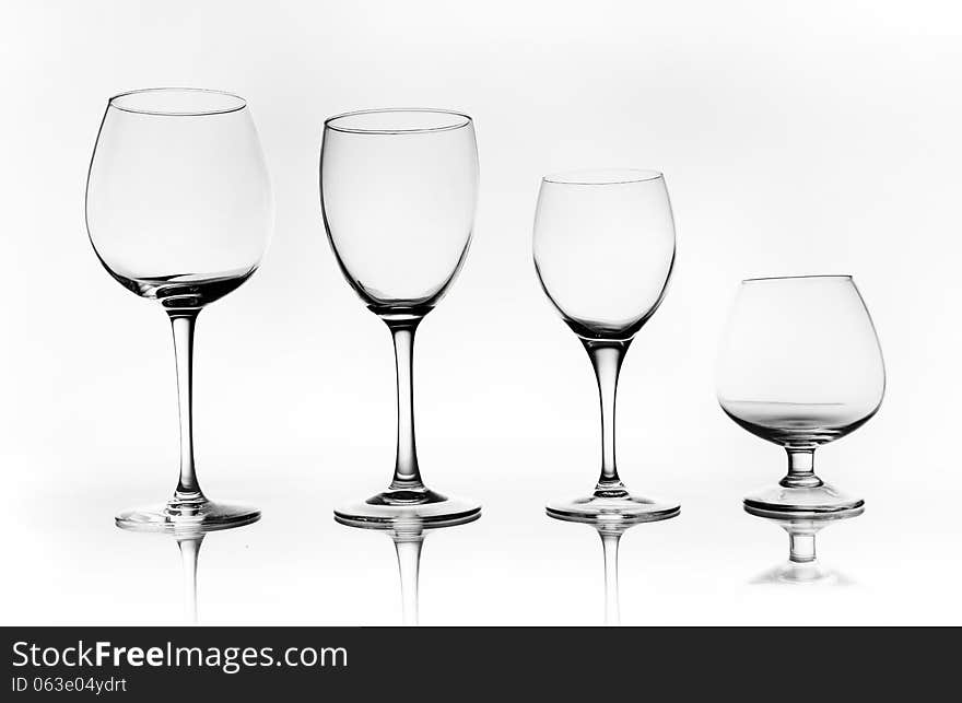 Group of glass cups over a white background. Group of glass cups over a white background