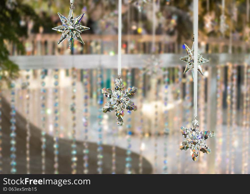 Snow flake cystals. Swarowsky crystal snow flake in a window during Christmas period