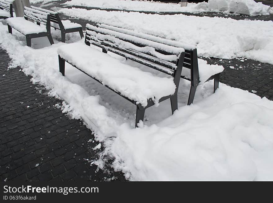 Bench snow covered in zurich, swisse, during winter season. Bench snow covered in zurich, swisse, during winter season