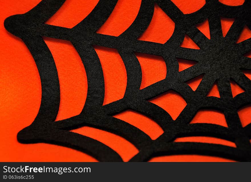 Black Spider Web On An Orange Background