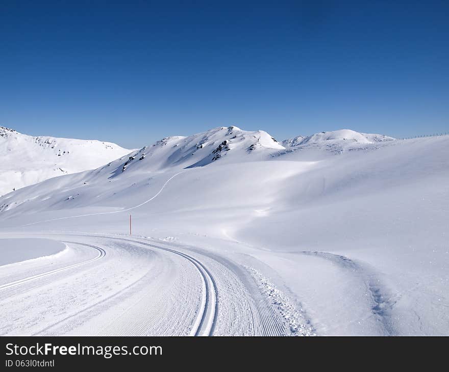 Winter hiking and langlauf trail in the alps at Koenigsleiten Austria